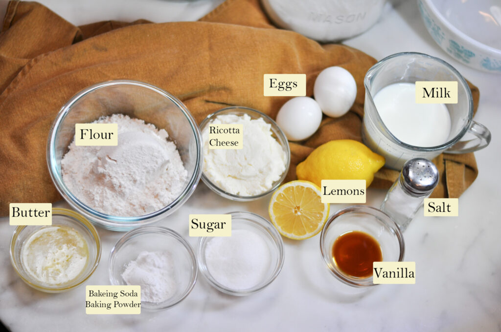 ingredients for pancakes in bowls with labels