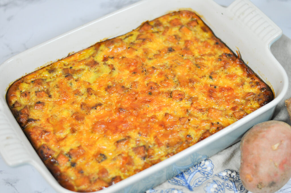 up close image of baked sweet potato and sausage casserole